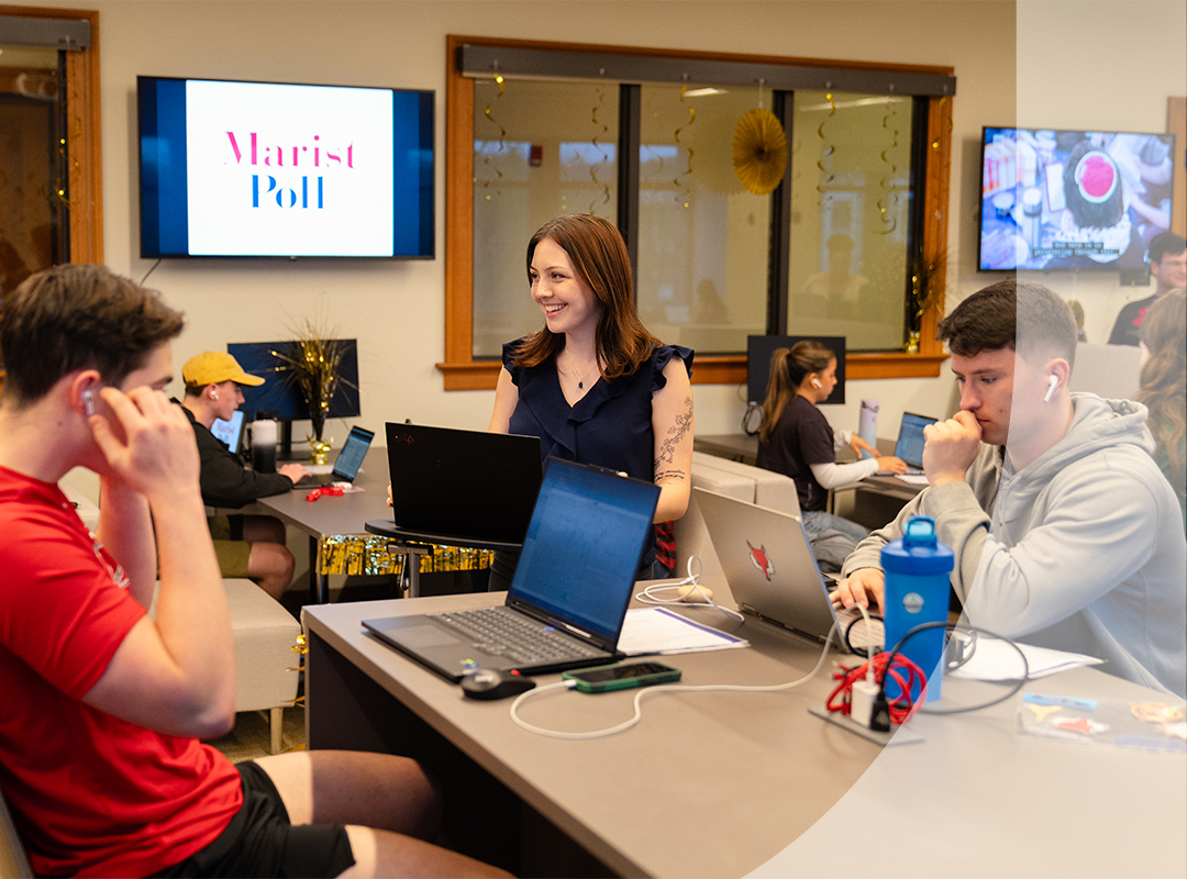 Students working at the Marist Poll.